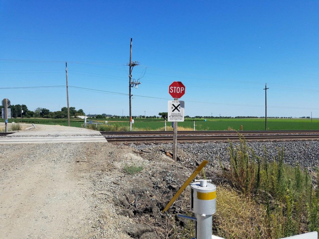 stop sign at railroad